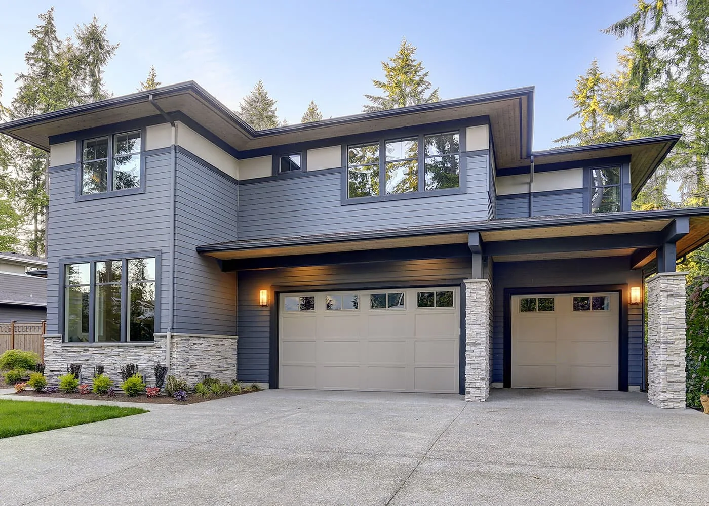 Modern two-story home with a three-car garage